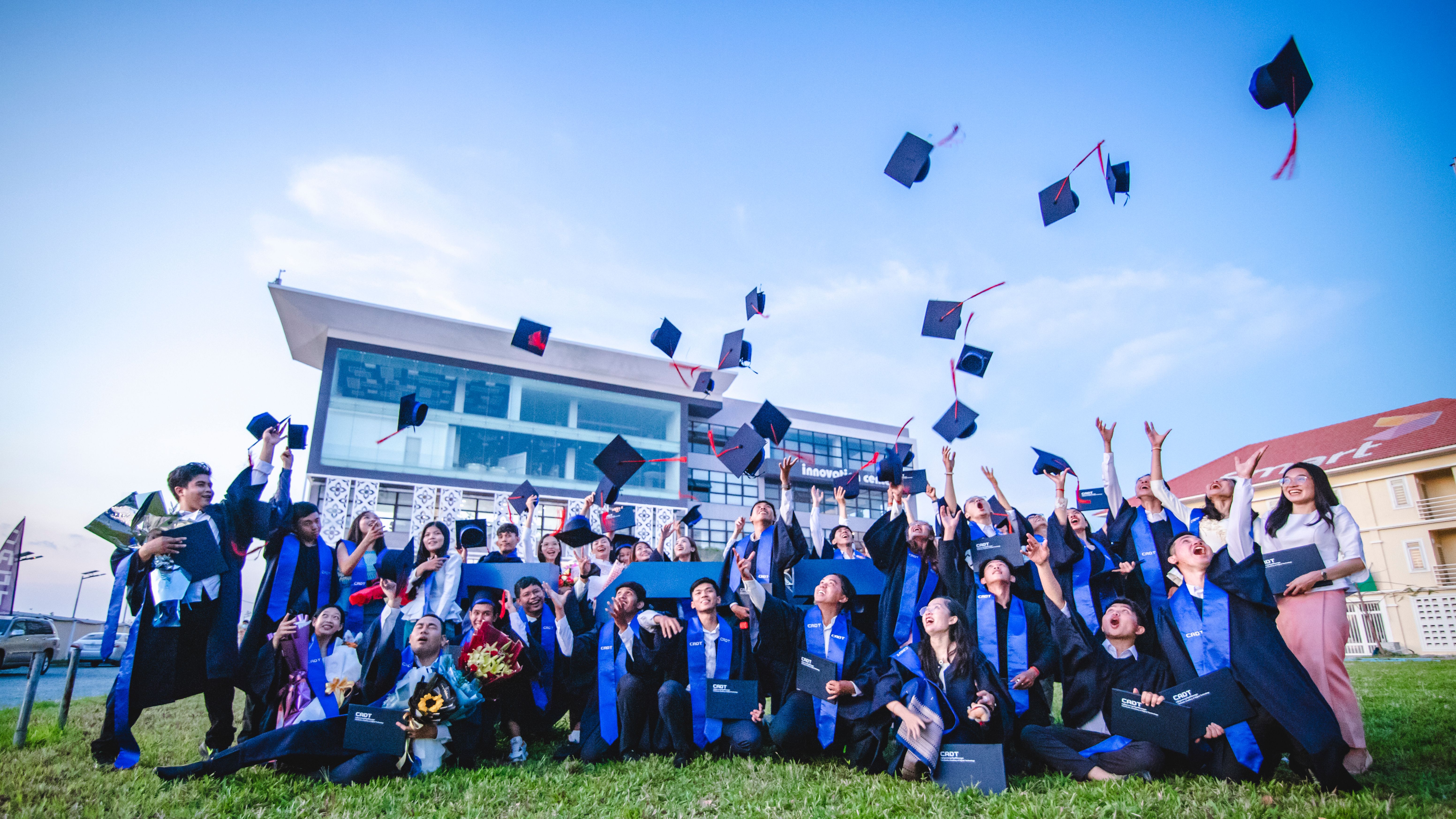 CADT graduates celebrating at commencement